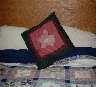 The fabric from this quilt was flower pounded and dyed from Daddy's amaryllis.  Yes, there is a longer story about Daddy's amaryllis. 
Ask me. bancado_family_site013004.jpg